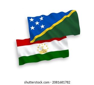 Banderas de olas de tela vectorial nacional de las Islas Salomón y Tayikistán aisladas en fondo blanco. de 1 a 2.