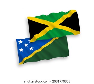 National vector fabric wave flags of Solomon Islands and Jamaica isolated on white background. 1 to 2 proportion.