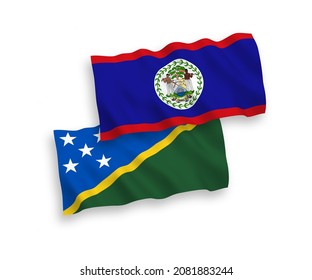 National vector fabric wave flags of Solomon Islands and Belize isolated on white background. 1 to 2 proportion.