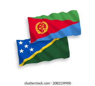 Banderas de olas de tela vectorial nacional de las Islas Salomón y Eritrea aisladas en fondo blanco. de 1 a 2.