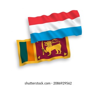 National vector fabric wave flags of Sri Lanka and Luxembourg isolated on white background. 1 to 2 proportion.