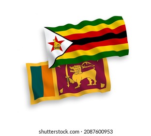 National vector fabric wave flags of Sri Lanka and Zimbabwe isolated on white background. 1 to 2 proportion.