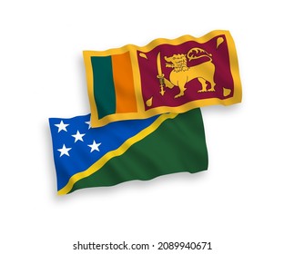 Nationale Vektor-Wellen-Flaggen von Sri Lanka und den Salomonen einzeln auf weißem Hintergrund. 1 bis 2 %.