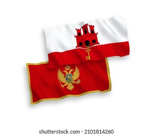 National vector fabric wave flags of Montenegro and Gibraltar isolated on white background. 1 to 2 proportion.