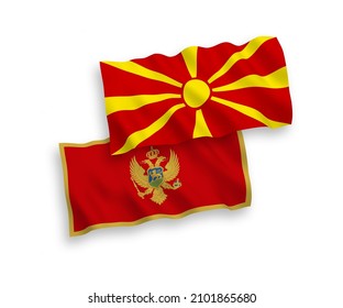 National vector fabric wave flags of Montenegro and North Macedonia isolated on white background. 1 to 2 proportion.
