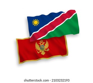 National vector fabric wave flags of Montenegro and Republic of Namibia isolated on white background. 1 to 2 proportion.