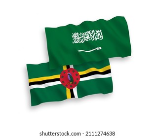 National vector fabric wave flags of Saudi Arabia and Dominica isolated on white background. 1 to 2 proportion.
