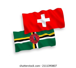 National vector fabric wave flags of Dominica and Switzerland isolated on white background. 1 to 2 proportion.