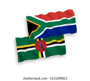 National vector fabric wave flags of Dominica and Republic of South Africa isolated on white background. 1 to 2 proportion.