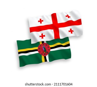 Banderas de olas de tela vectorial nacional de Dominica y Georgia aisladas en fondo blanco. de 1 a 2.