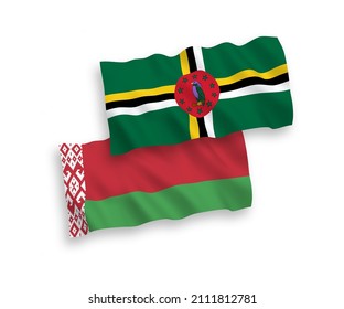 Banderas de olas de tela vectorial nacional de Dominica y Bielorrusia aisladas en fondo blanco. de 1 a 2.