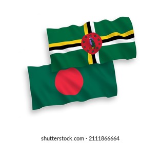 National vector fabric wave flags of Dominica and Bangladesh isolated on white background. 1 to 2 proportion.