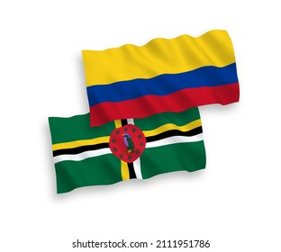 Banderas de olas de tela vectorial nacional de Dominica y Colombia aisladas en fondo blanco. de 1 a 2.
