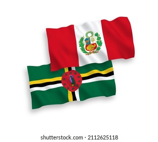National vector fabric wave flags of Dominica and Peru isolated on white background. 1 to 2 proportion.