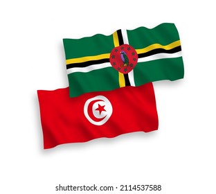 National vector fabric wave flags of Dominica and Republic of Tunisia isolated on white background. 1 to 2 proportion.