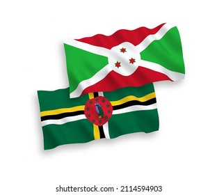 National vector fabric wave flags of Dominica and Burundi isolated on white background. 1 to 2 proportion.
