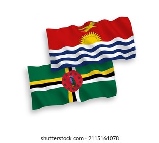 National vector fabric wave flags of Dominica and Republic of Kiribati isolated on white background. 1 to 2 proportion.