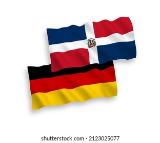 National vector fabric wave flags of Germany and Dominican Republic isolated on white background. 1 to 2 proportion.