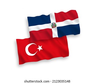 National vector fabric wave flags of Turkey and Dominican Republic isolated on white background. 1 to 2 proportion.
