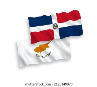 National vector fabric wave flags of Cyprus and Dominican Republic isolated on white background. 1 to 2 proportion.