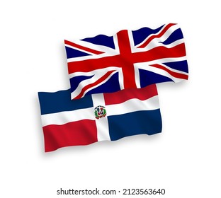 Banderas de olas de tela vectorial nacional de Gran Bretaña y República Dominicana aisladas en fondo blanco. de 1 a 2.