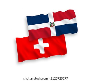 National vector fabric wave flags of Dominican Republic and Switzerland isolated on white background. 1 to 2 proportion.