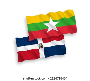 Banderas de olas de tela vectorial nacional de la República Dominicana y Myanmar aisladas en fondo blanco. de 1 a 2.