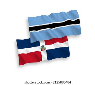 Banderas de olas de tela vectorial nacional de la República Dominicana y Botswana aisladas en fondo blanco. de 1 a 2.