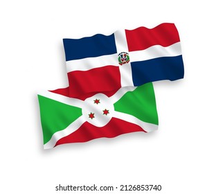 National vector fabric wave flags of Dominican Republic and Burundi isolated on white background. 1 to 2 proportion.