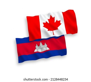 National vector fabric wave flags of Canada and Kingdom of Cambodia isolated on white background. 1 to 2 proportion.