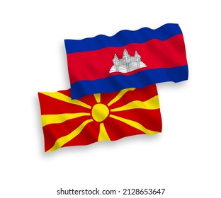 National vector fabric wave flags of Kingdom of Cambodia and North Macedonia isolated on white background. 1 to 2 proportion.