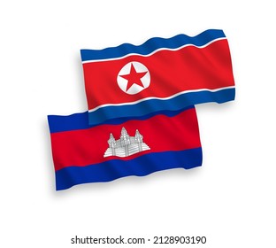 Banderas de olas de tela vectorial nacional de Corea del Norte y el Reino de Camboya aisladas en fondo blanco. de 1 a 2.