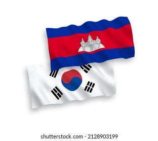 National vector fabric wave flags of South Korea and Kingdom of Cambodia isolated on white background. 1 to 2 proportion.