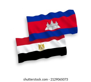 National vector fabric wave flags of Kingdom of Cambodia and Egypt isolated on white background. 1 to 2 proportion.