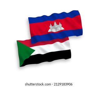 National vector fabric wave flags of Kingdom of Cambodia and Sudan isolated on white background. 1 to 2 proportion.