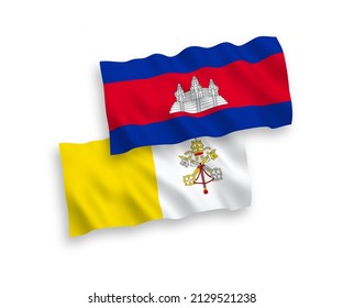 National vector fabric wave flags of Kingdom of Cambodia and Vatican isolated on white background. 1 to 2 proportion.