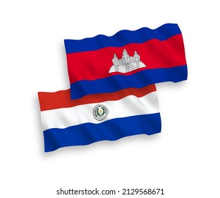 Banderas de olas de tela vectorial nacional del Reino de Camboya y el Paraguay aisladas en fondo blanco. de 1 a 2.