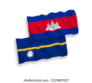 National vector fabric wave flags of Kingdom of Cambodia and Republic of Nauru isolated on white background. 1 to 2 proportion.