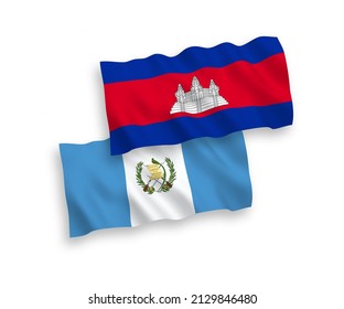 National vector fabric wave flags of Kingdom of Cambodia and Republic of Guatemala isolated on white background. 1 to 2 proportion.