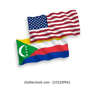 National vector fabric wave flags of Union of the Comoros and USA isolated on white background. 1 to 2 proportion.