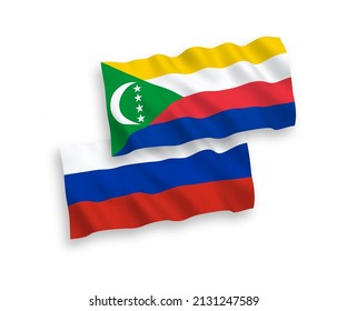 Banderas de olas de tela vectorial nacional de la Unión de las Comoras y Rusia aisladas en fondo blanco. de 1 a 2.