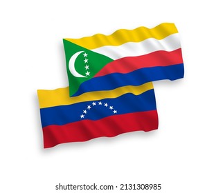 National vector fabric wave flags of Venezuela and Union of the Comoros isolated on white background. 1 to 2 proportion.