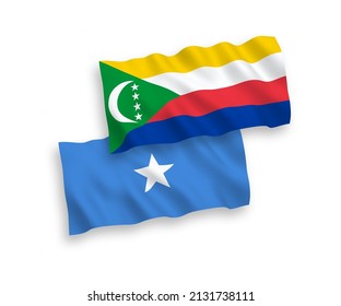 National vector fabric wave flags of Union of the Comoros and Somalia isolated on white background. 1 to 2 proportion.
