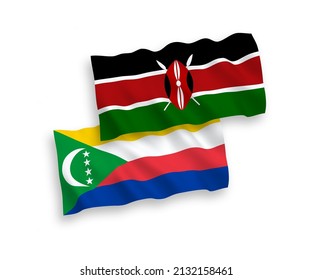 National vector fabric wave flags of Union of the Comoros and Kenya isolated on white background. 1 to 2 proportion.