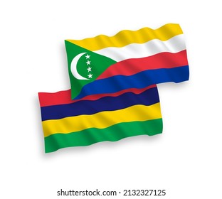 National vector fabric wave flags of Union of the Comoros and Republic of Mauritius isolated on white background. 1 to 2 proportion.