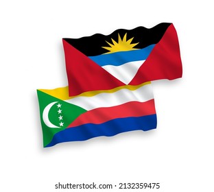 Banderas de olas de tela vectorial nacional de la Unión de las Comoras y Antigua y Barbuda aisladas de fondo blanco. de 1 a 2.