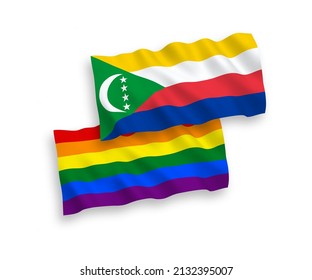 National vector fabric wave flags of Union of the Comoros and Rainbow gay pride isolated on white background. 1 to 2 proportion.