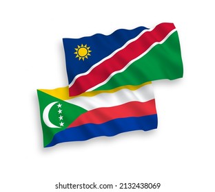 Nationale Vektor-Wellen-Flaggen der Union der Komoren und der Republik Namibia einzeln auf weißem Hintergrund. 1 bis 2 %.