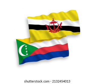 Banderas de olas de tela vectorial nacional de la Unión de las Comoras y Brunéi aisladas de fondo blanco. de 1 a 2.