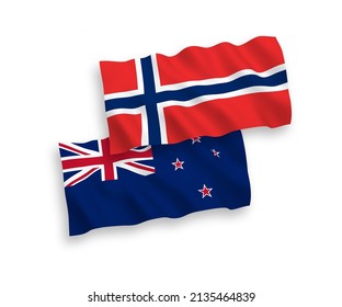National vector fabric wave flags of Norway and New Zealand isolated on white background. 1 to 2 proportion.